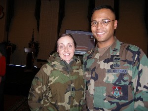 Capt. Doug Freeman, USAF, and Capt. Angie Freeman, USAF, two of the chapter's International Young AFCEANS, enjoy the January luncheon and career fair.